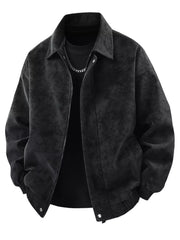 Distressed faux leather zip jacket in black with a collared neckline and buttoned cuffs.