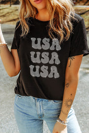 Black t-shirt with stacked rhinestone USA graphic, crew neck, short sleeves
