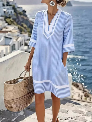 Blue and white striped v-neck dress with pockets and 3/4 sleeves