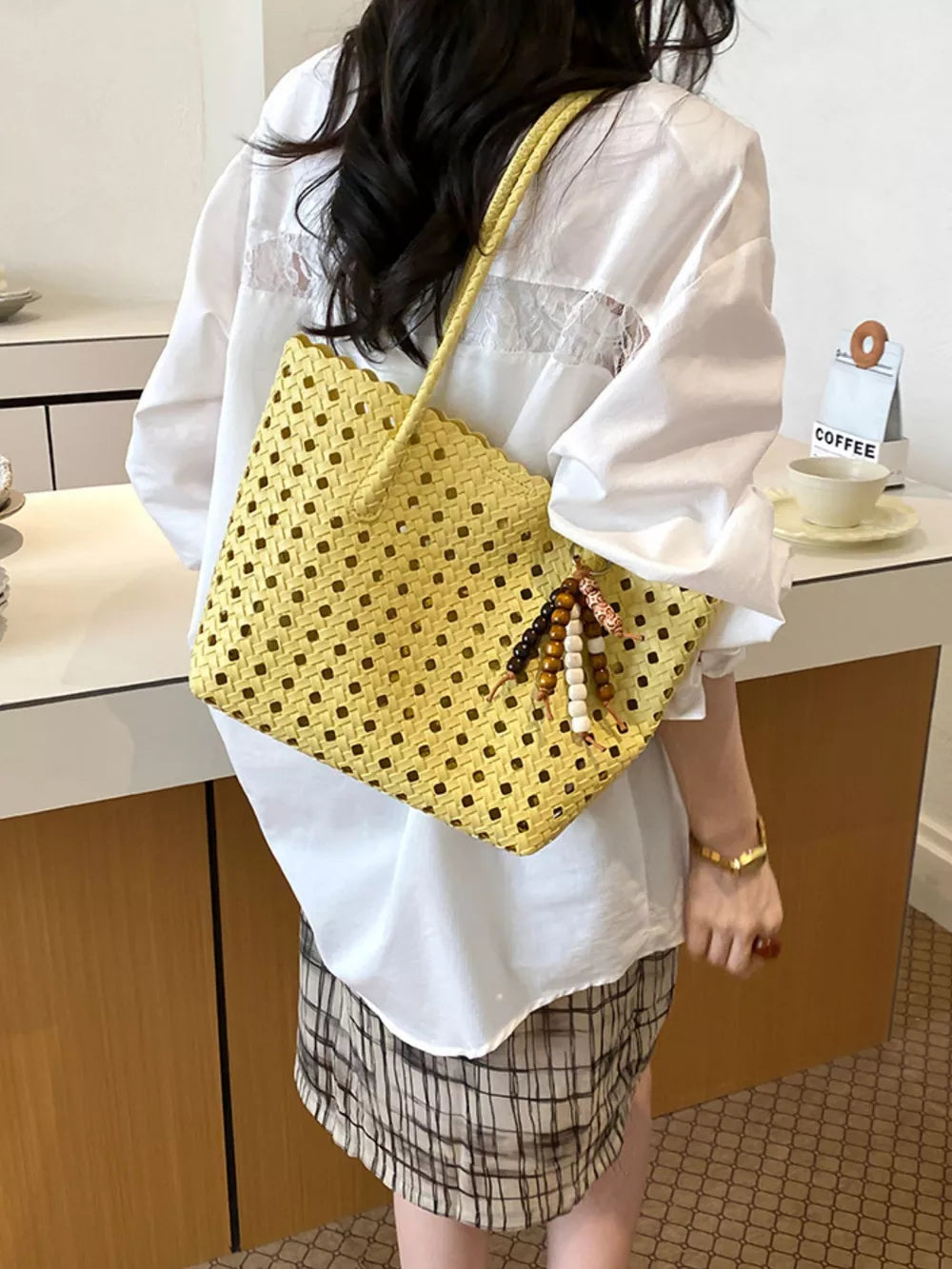 Cutout Leather Shoulder Bag in Yellow, close-up detail