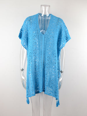Light blue open-knit V-neck beach cover-up with short sleeves and tassel hem