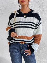Colorblock stripe knit crewneck sweater in caramel, black, and white acrylic with a relaxed fit.