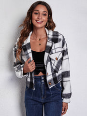 Chic plaid jacket with buttoned pockets and collar, shown in white and dark blue plaid.