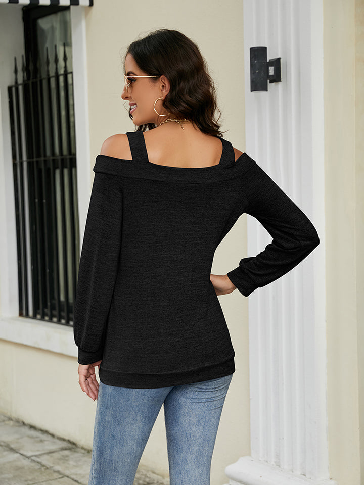 Black off-shoulder square neck cutout top with long sleeves and a relaxed fit.