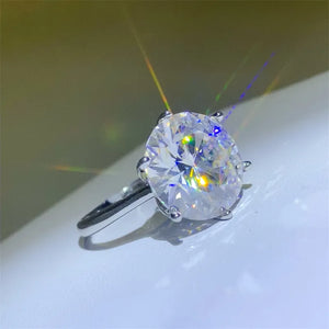 Solitaire Prism Ring in silver with a large oval-cut clear stone.