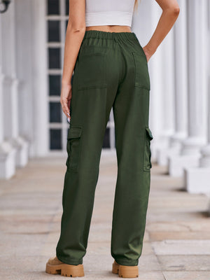 Dark green cargo pants with utility pockets and a wide-leg cut.