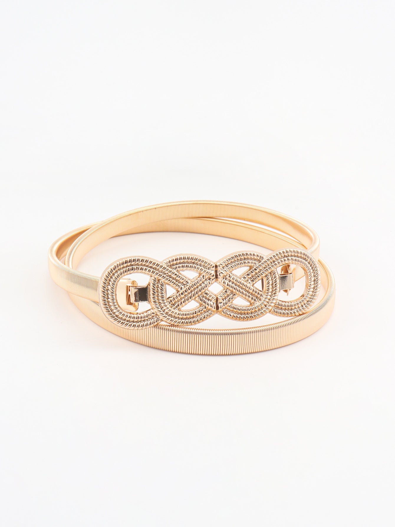 Gold elastic belt with intertwined knot detail and gold buckle clasp