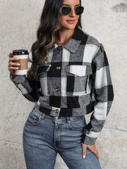 Checked plaid shacket in black and white with patch pockets and button front.