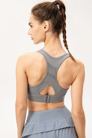 Light Gray Mesh-Inset Performance Sports Bra with racerback and hook-and-eye closure.