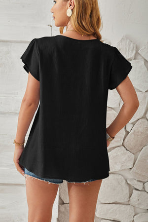Black textured V-neck blouse with pleated flutter sleeves.