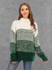 Colorblock knit turtleneck sweater in green and white with defined panels and ribbed cuffs.