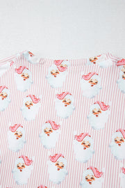 Blush pink striped loungewear set with a repeating Santa Claus print.