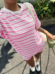 Pink striped relaxed fit two-piece set with a crew neck and short sleeves.