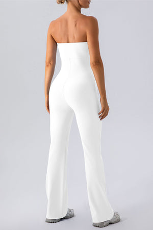 White ribbed bandeau flare leg jumpsuit with a seamless design.