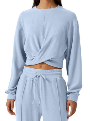 Light blue cropped twist-front top and relaxed drawstring pants set
