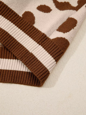 Chic leopard print knit sweater with brown and cream stripes on the hem.