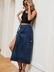 Denim midi skirt in dark wash with thigh slit and button front detail.
