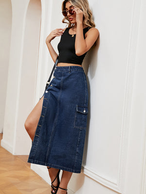 Denim midi skirt in dark wash with thigh slit and button front detail.