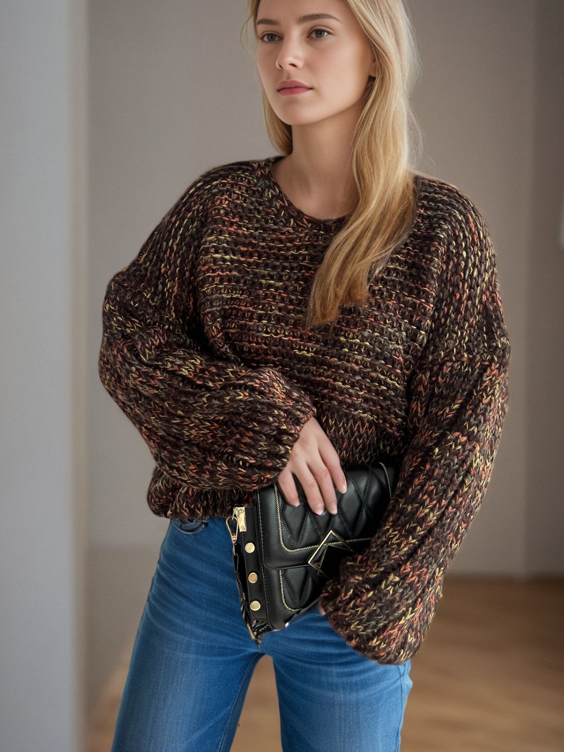 Textured knit sweater in coffee brown with balloon sleeves and crew neck.