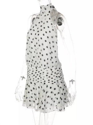 White polka dot halter neck mini dress with ruched waist detail