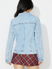 Light wash denim jacket with classic details and buttoned cuffs.