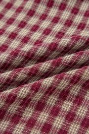 Country plaid blouse in burgundy and cream, showing fabric texture and weave.