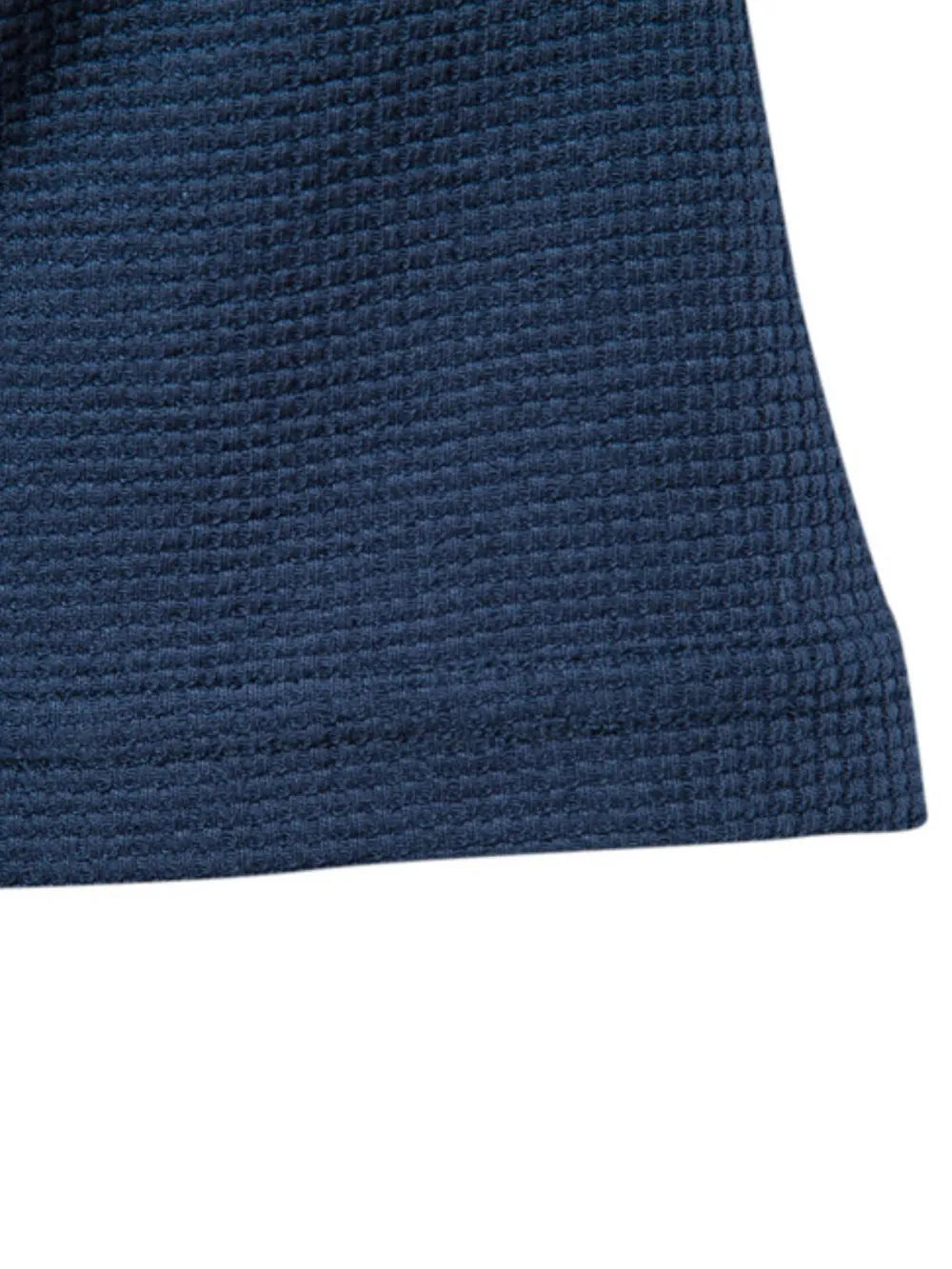 Navy crew-neck t-shirt knit with a textured waffle weave.