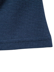 Navy crew-neck t-shirt knit with a textured waffle weave.