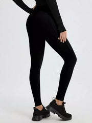 Black maternity active pants with cargo pockets and a high waist.