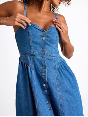 Button-front midi denim dress with pockets and a-line cut.