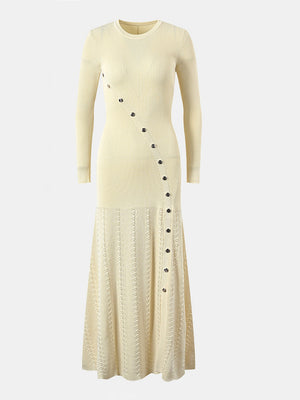 Pastel yellow ribbed knit maxi dress with decorative buttons and open knit skirt.