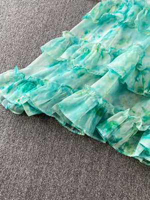 Light green floral ruffle bikini bottom with bow detail