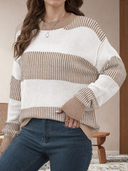 Nautical stripe knit crewneck sweater in tan and white with ribbed cuffs and neckline.