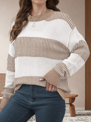 Nautical stripe knit crewneck sweater in tan and white with ribbed cuffs and neckline.