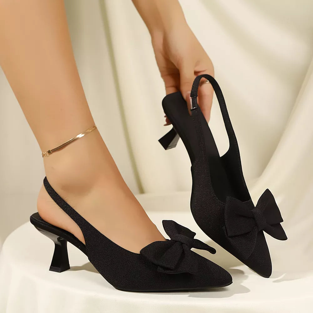 Elegant Bow Slingback Pumps in White, model styling view