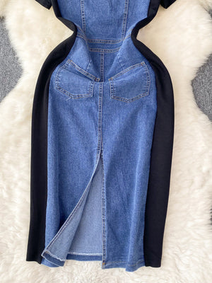 Denim patchwork short-sleeve dress in dark blue with black sleeves and back slit.