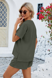 Waffle knit henley short set in dark green with short sleeves and side slits on top.