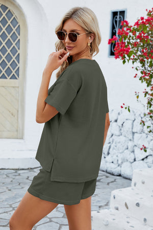 Waffle knit henley short set in dark green with short sleeves and side slits on top.