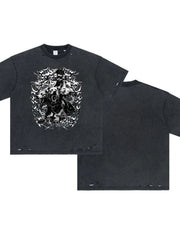 Black oversized graphic tee with distressed details and a mythical creature print.