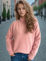 Relaxed raglan turtleneck knit sweater in Blush Pink with ribbed cuffs and hem.