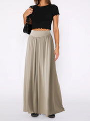 Khaki jersey wide-leg trousers with drape-front and elastic waistband.