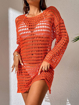 Orange open-knit beach dress with long sleeves and boatneck, styled with a white bikini.