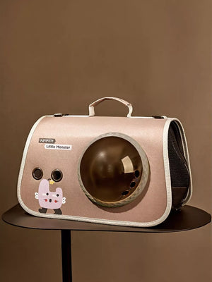 Charming bubble window pet carrier in blush pink with cute decal and amber tint dome.