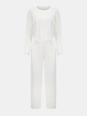 White waffle knit cropped lounge set with long sleeves and wide-leg pants.