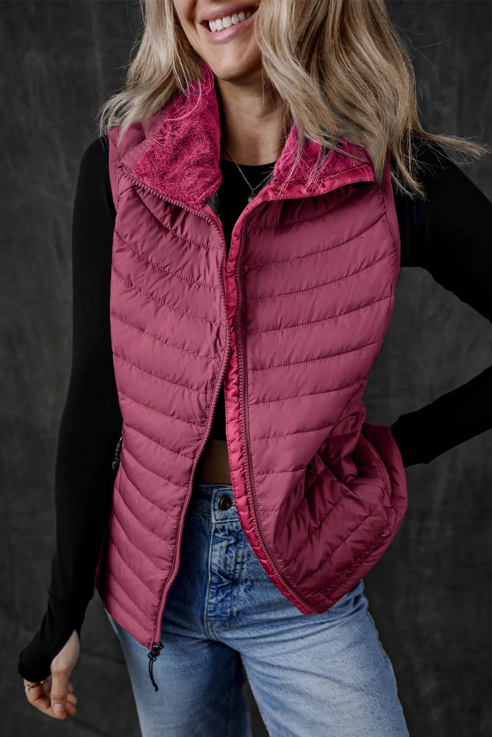 Deep Purple quilted puffer vest with a fuzzy fleece collar and zipper front.