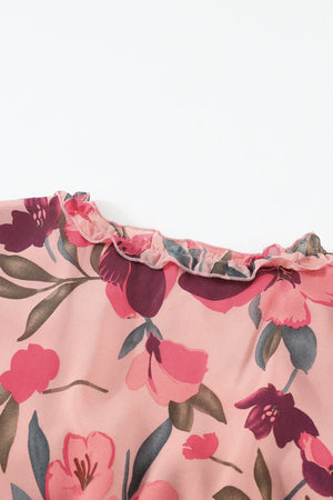 Floral ruffle maxi dress in pink with a tiered skirt and floral pattern.