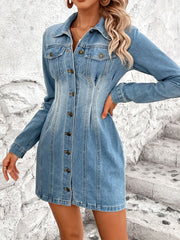 Medium wash denim button-down mini dress with long sleeves and a fitted silhouette.