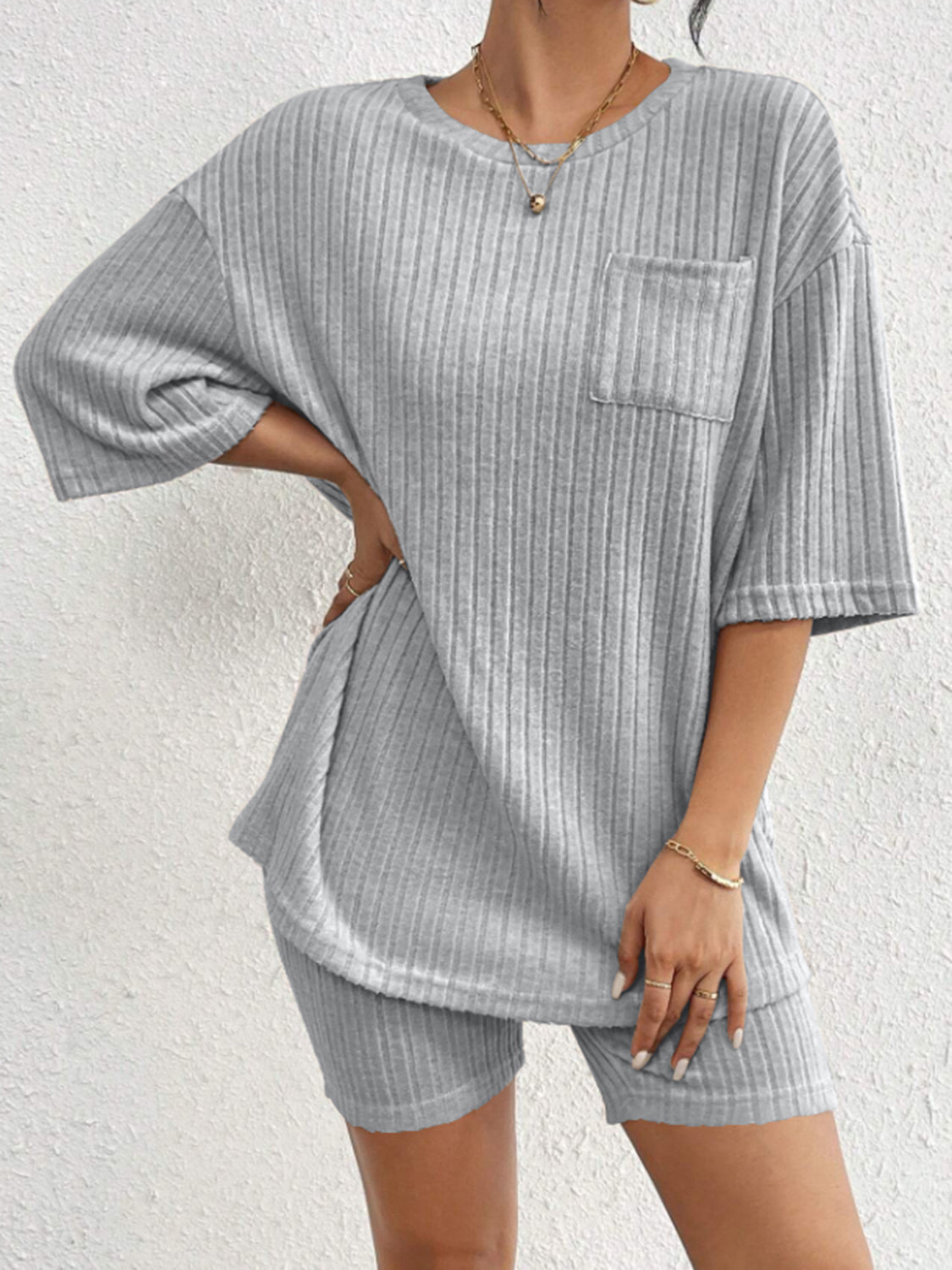 Light Gray ribbed loungewear set with short sleeves, crew neck, and pocket detail.