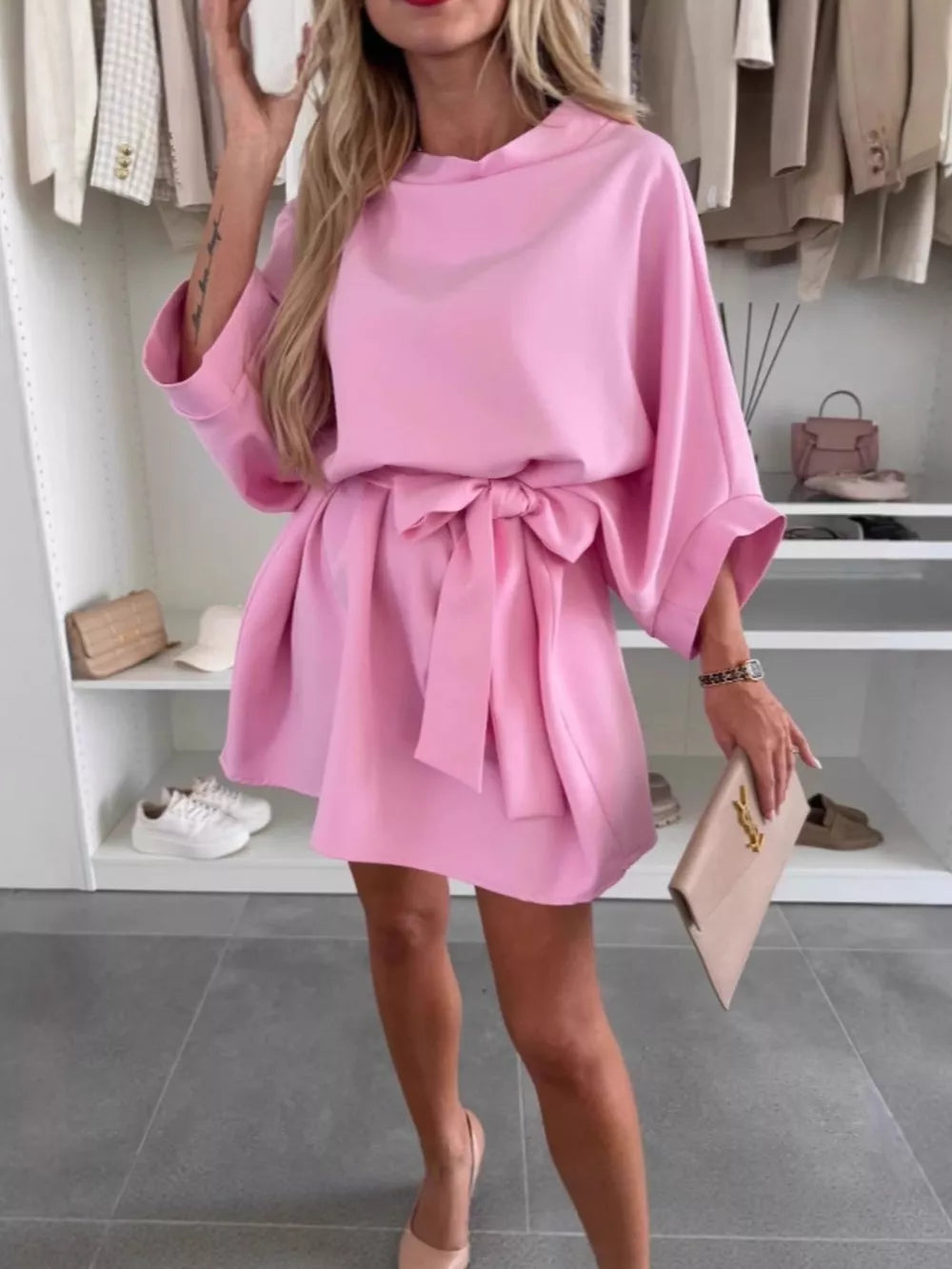 Pink batwing sleeve mini dress with tie waist, above knee length, casual chic style.