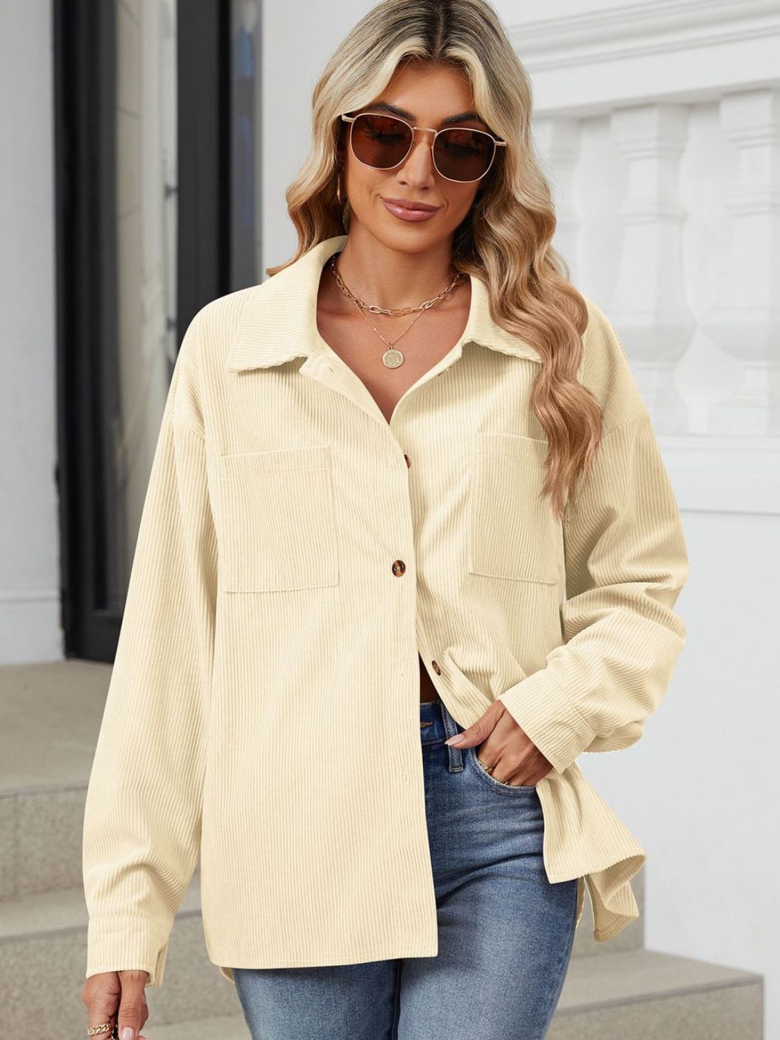 Pastel yellow corduroy overshirt with patch pockets and button front.